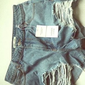 High waisted distressed denim shorts